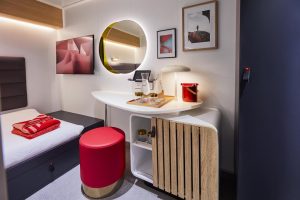 Solo insider cabin showing seating area and makeup station