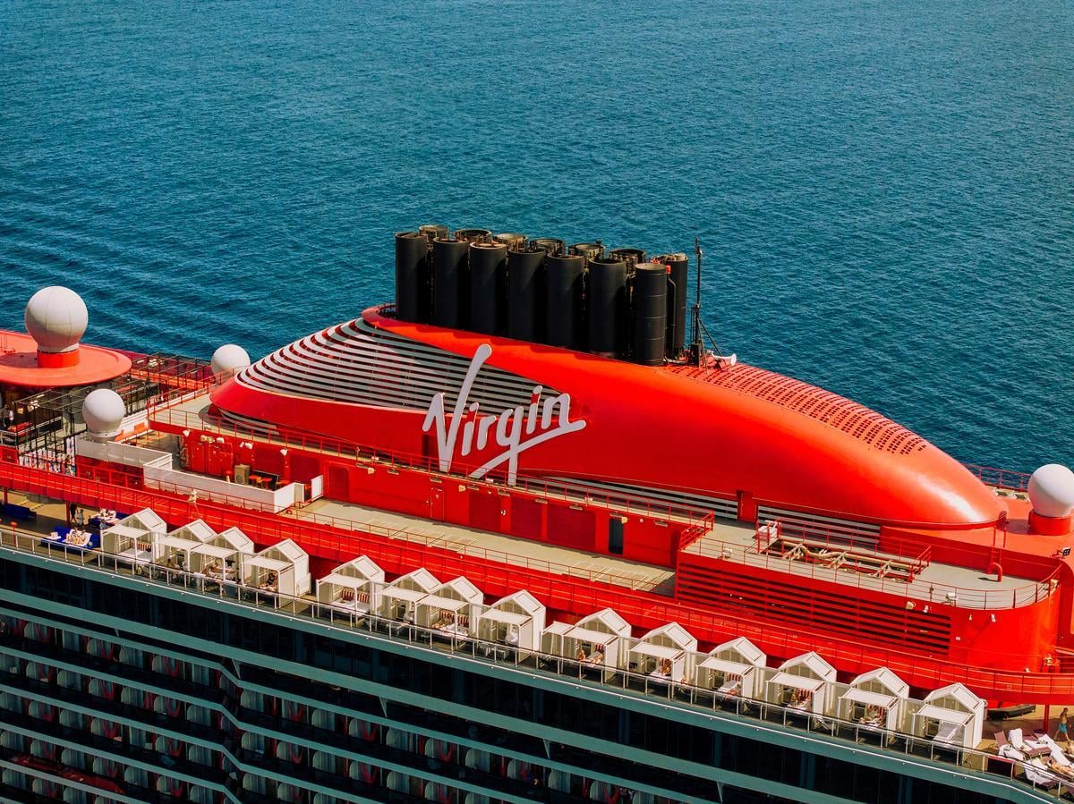 Luxurious Virgin Voyages cruise ship at sea | Virgin Voyages | Virgin Voyages deals and discounts
