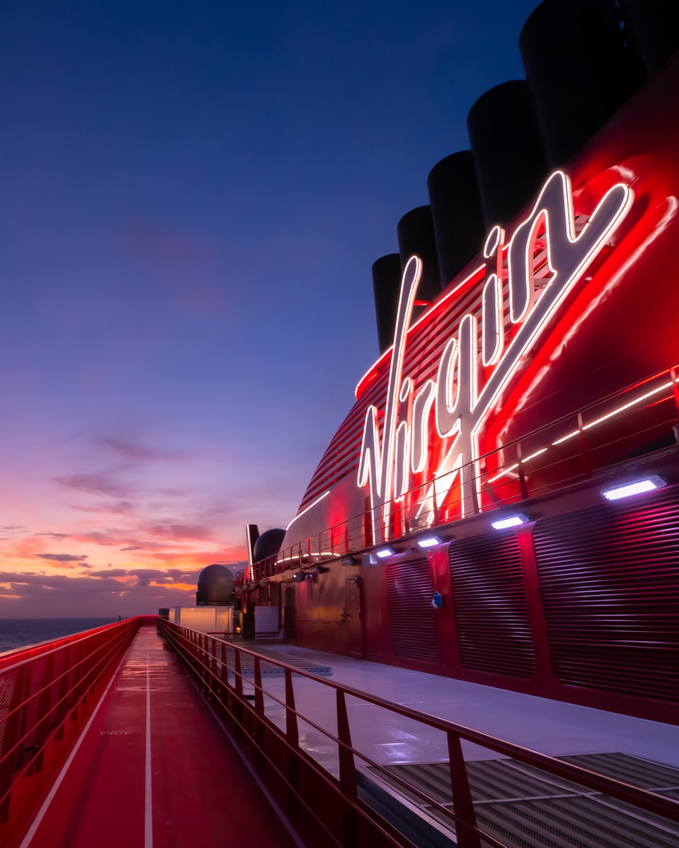 IMG SHIP Virgin Sign Illuminated Sunset ginajoyphoto1 Illuminated Virgin sign at sunset | Virgin Voyages Black Friday deals